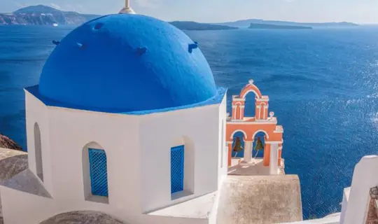 Blue domes of the Oia city, in santorini